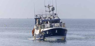 Un bateau revient d'une campagne de pêche